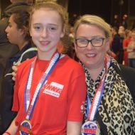 170 Ruby shows off her team gold with mum Helena.JPG